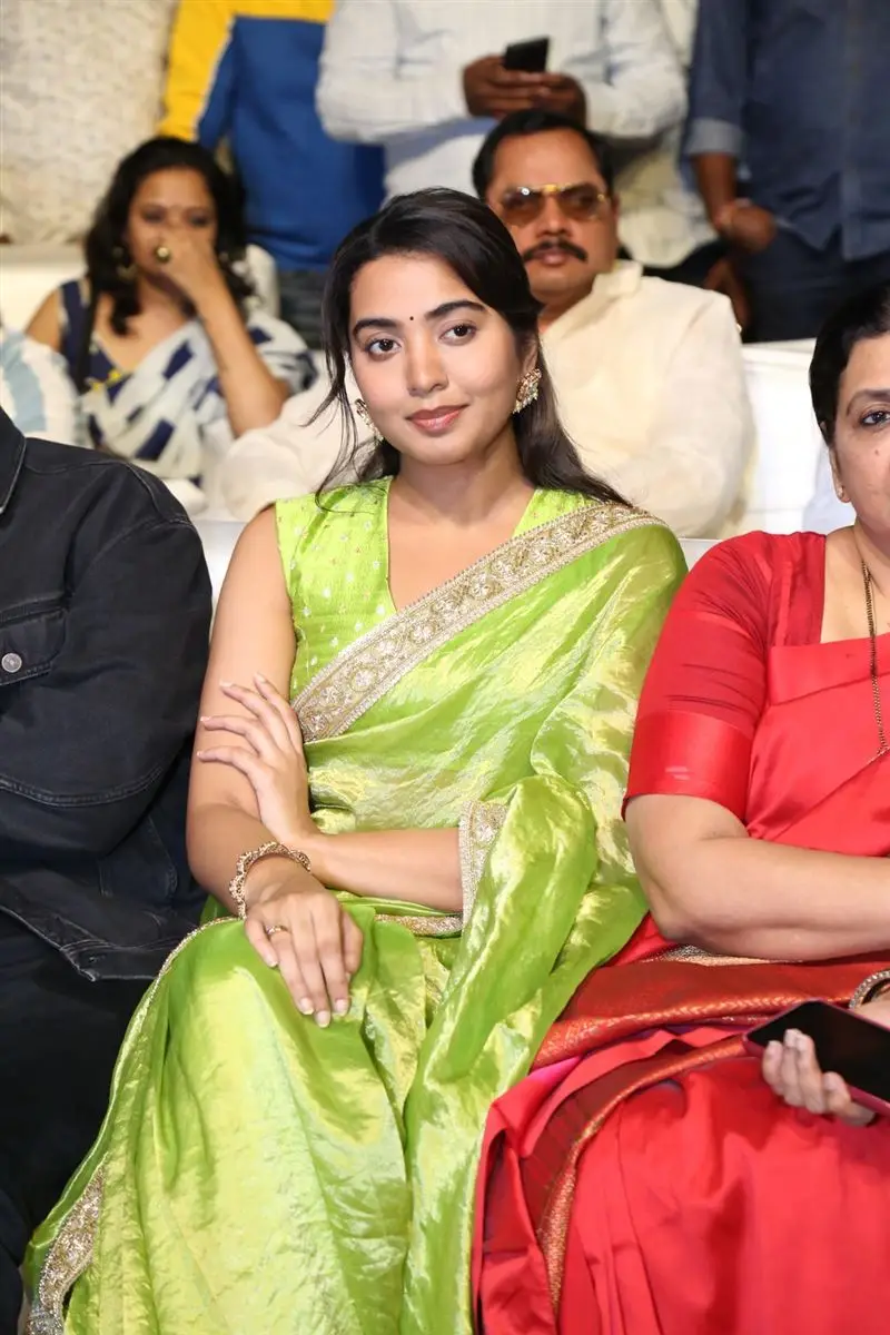 Shivathmika Rajashekar in Green Saree Sleeveless Blouse